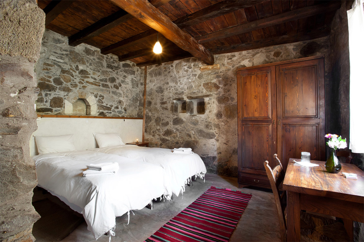Milia Crete Hotel bedroom stone walls traditional