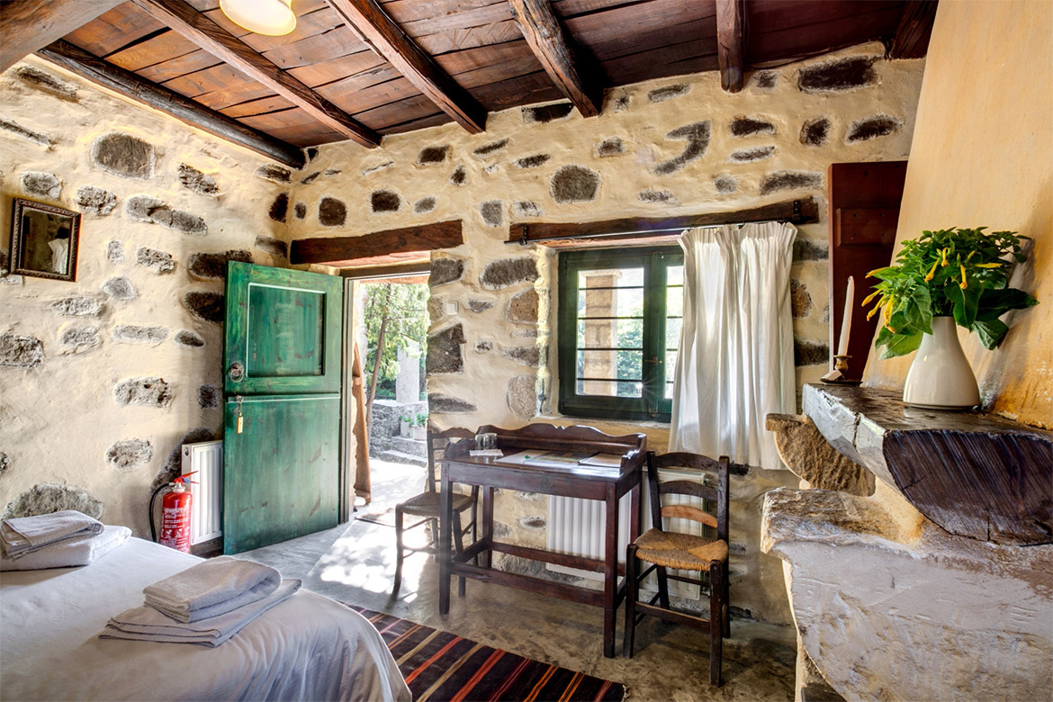 Milia Crete Hotel stone walls room