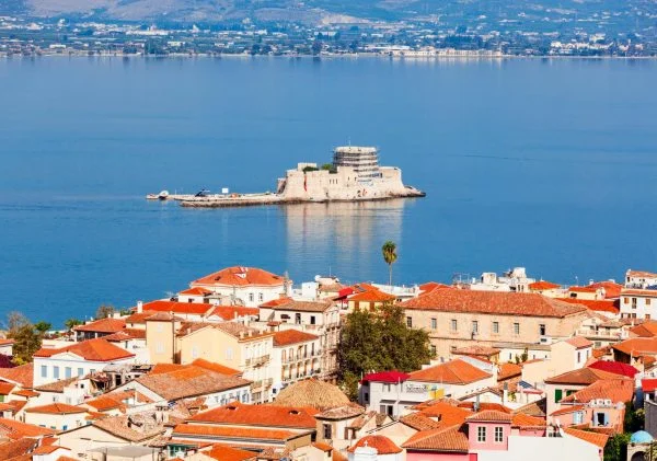 view of Bourtzi over rooftops Nafplio