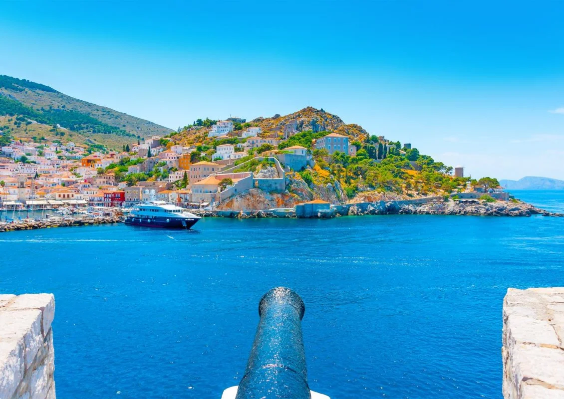 sea view of Hydras harbour and canon