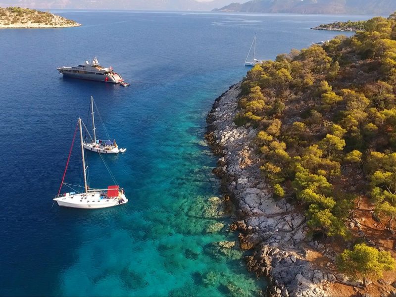 Agistri island turquoise waters and boats