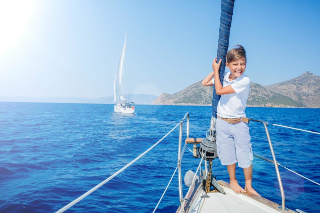 boy on sailing boat