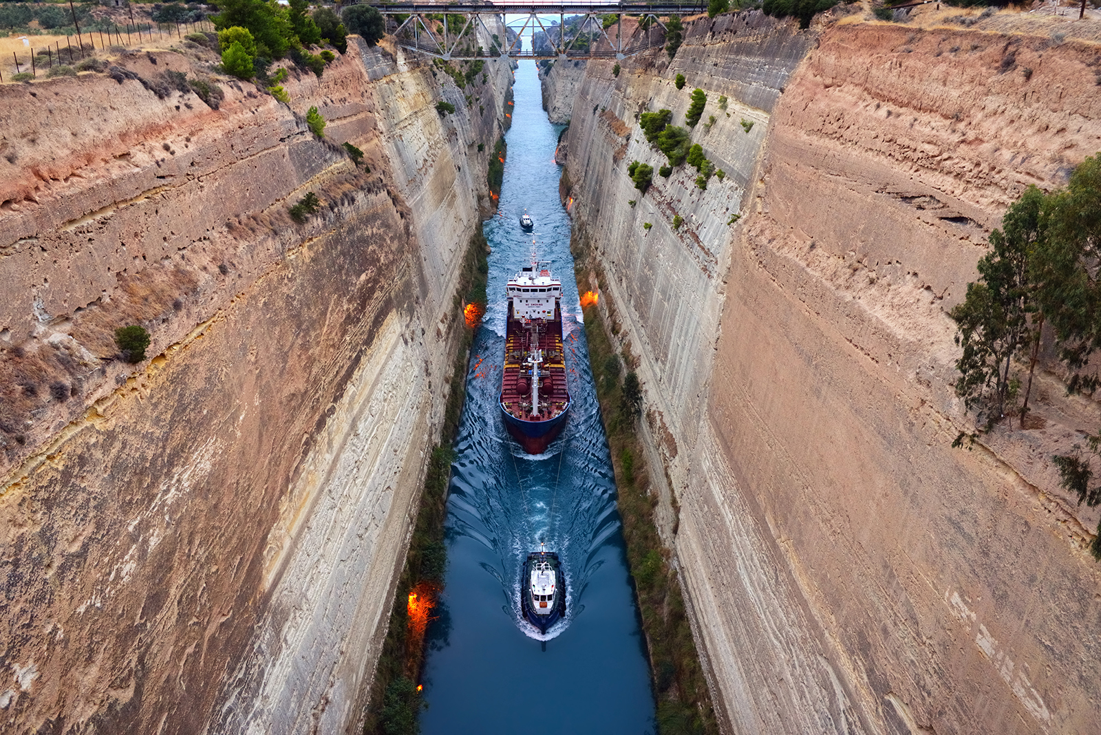 Ship crossing the Corinth Canal in Greece at sunset time