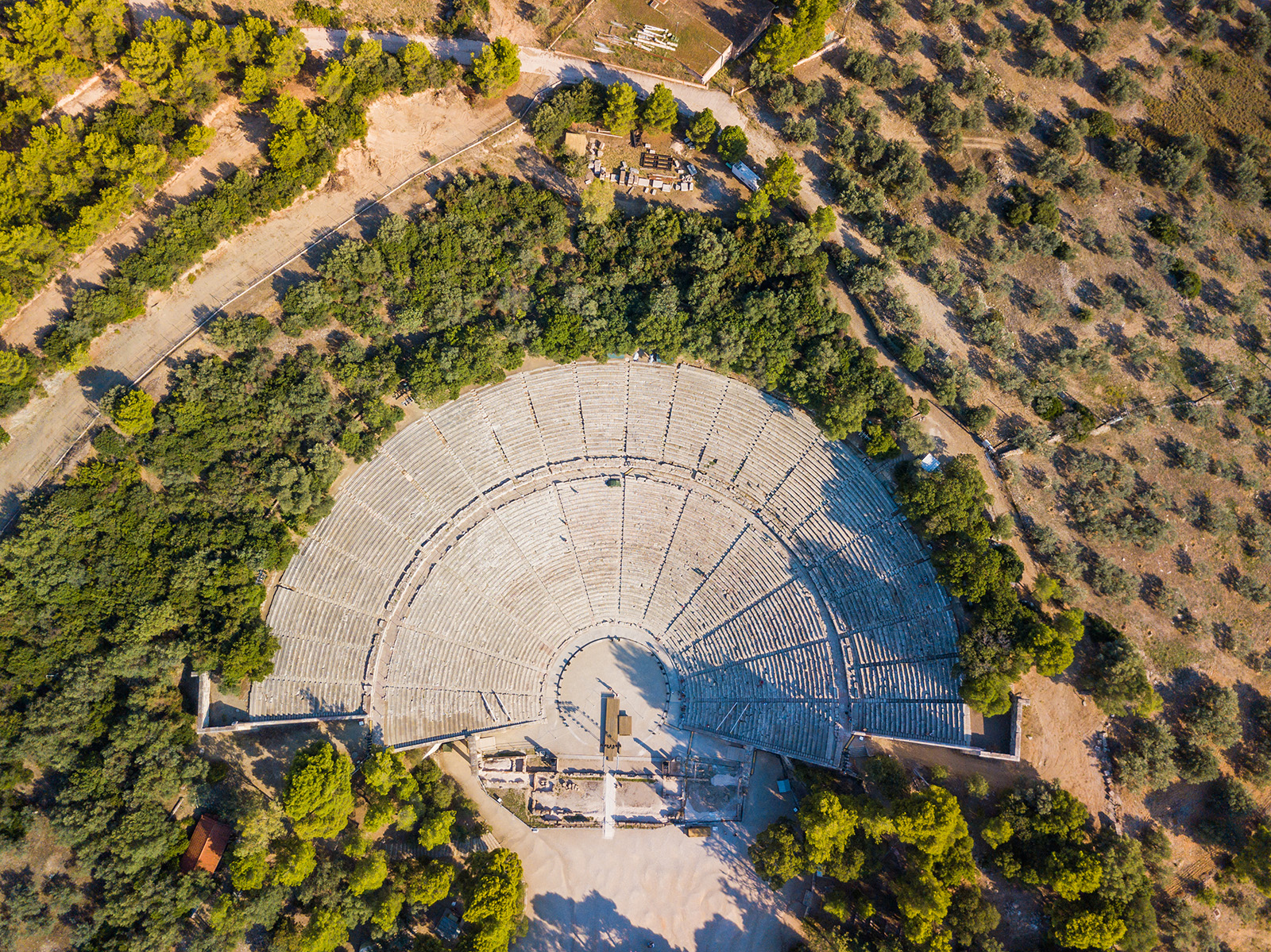 Aerial drone bird's eye view photo of Ancient amphitheater of Epidaurus at Peloponnese, Greece