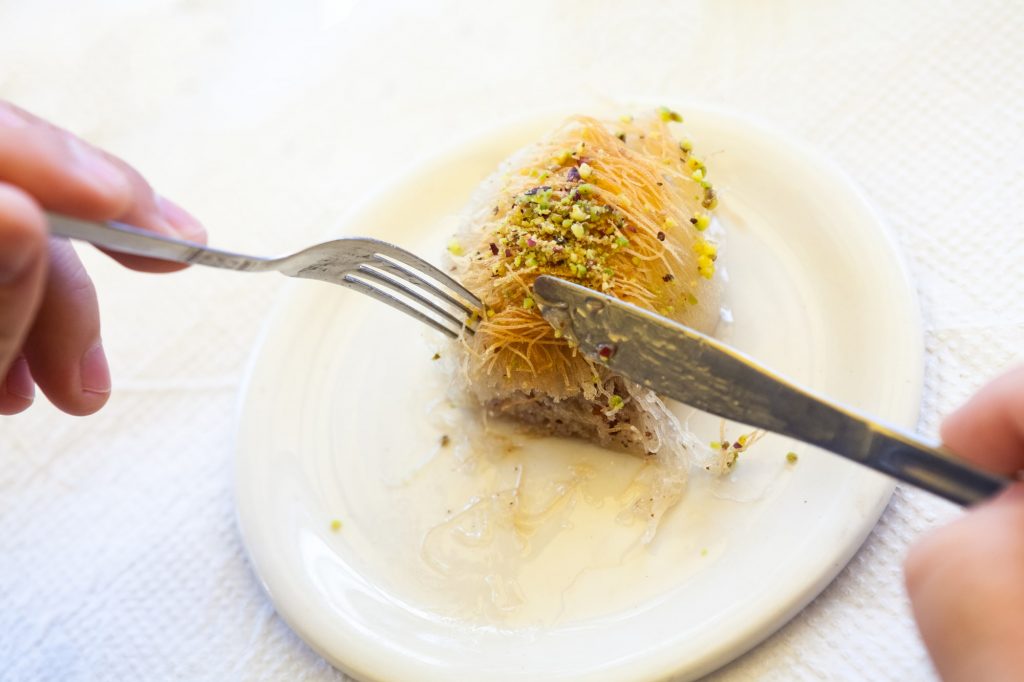 Kataif cake on a white plate DP-min