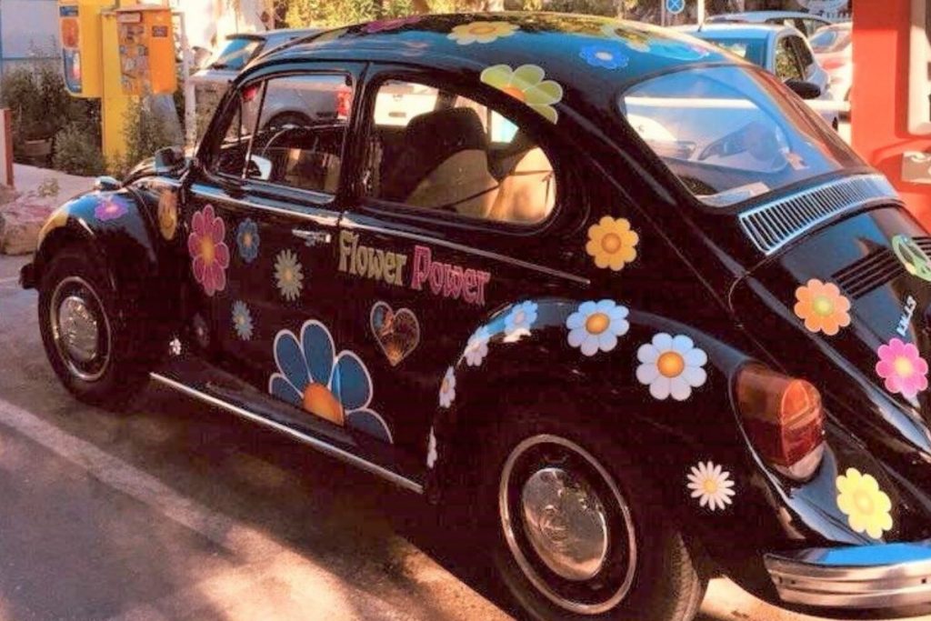 Matala Village Crete Hippies Town MT car with flowers