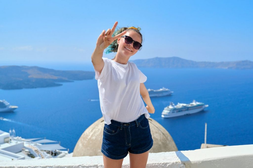 Teenager girl happy in Santorini Candera CV