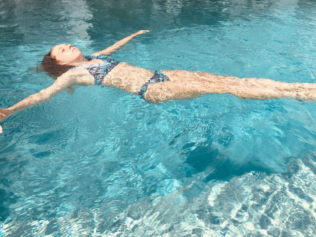 Teenager swimming in Greek islands-min
